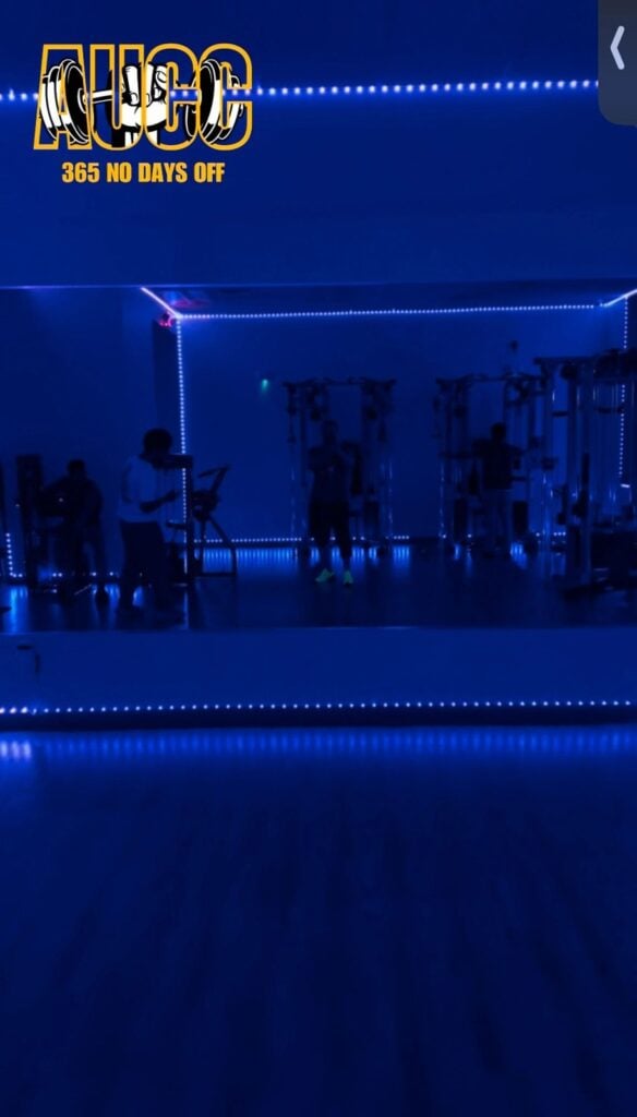 Members training in the blue-lit Selector City zone at AUCC